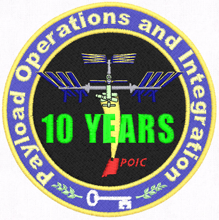 The design, marking the 10-year anniversary  of the Payload Operations and Integration Center, was digitized and stitched by Threadbearer.